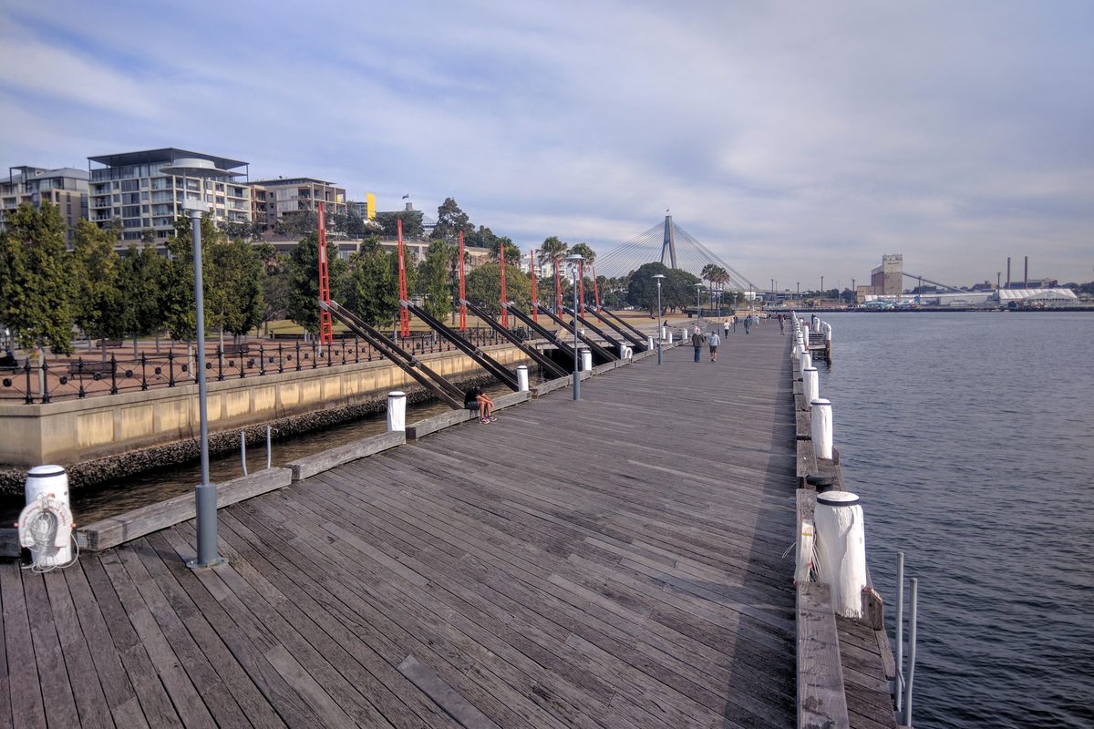 The timber boardwalk along the water at Pirrama Park, Pyrmont