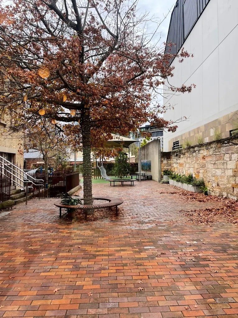The brick courtyard and play area at the Pyrmont Community Centre